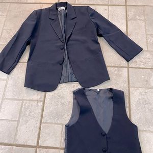 Smoke free home. 3 piece suit. Worn once. Wear separately or all together